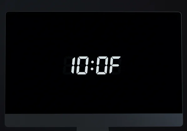 A full-screen digital clock on a monitor, clean and precise.